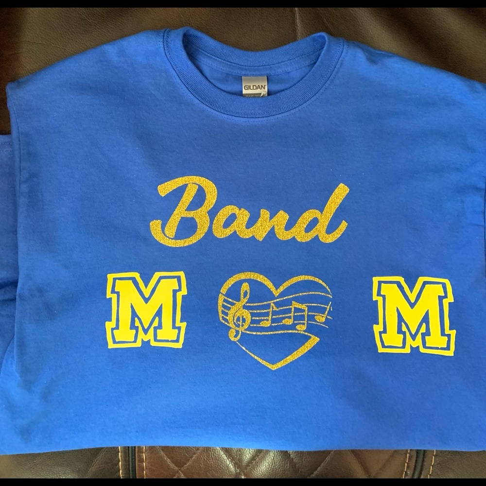 Show your pride in your child who is in the band! Shirt can be customized!